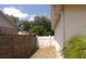 View of a partially fenced side yard at 1714 Urbana Ave, Deltona, FL 32725