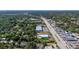 An aerial view shows the area surrounding the property, including the roads and buildings at 1738 Palm Rd, Ormond Beach, FL 32174