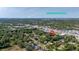 An aerial view showcases Daytona International Speedway and the surrounding neighborhood at 1738 Palm Rd, Ormond Beach, FL 32174