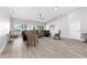 Spacious living room with wood floors, modern furniture, and plenty of natural light at 1738 Palm Rd, Ormond Beach, FL 32174