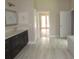 Elegant bathroom with a modern vanity and stylish tile flooring at 1870 Pepper Tree Ln, Deland, FL 32720