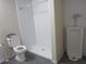 Bathroom featuring a walk-in shower, toilet, and urinal at 1870 Pepper Tree Ln, Deland, FL 32720