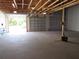 Large unfinished garage with multiple bays at 1870 Pepper Tree Ln, Deland, FL 32720