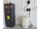 Modern water heater and pressure tank in the utility room at 1870 Pepper Tree Ln, Deland, FL 32720