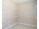 Spacious walk-in closet with wire shelving providing ample storage space at 1870 Pepper Tree Ln, Deland, FL 32720