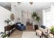 Comfortable living room featuring wood-look floors, neutral walls, and stylish decor at 20 Monroe Ave, Debary, FL 32713