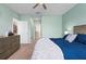 Comfortable bedroom with neutral paint, ceiling fan, and lots of natural light at 2000 White Pelican Ter, Sanford, FL 32771