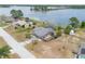 Beautiful aerial shot of a home, lake access, and community at 2055 Little Farms Ct, Deltona, FL 32738