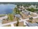 Expansive aerial view showcasing the home's proximity to the lake and neighborhood at 2055 Little Farms Ct, Deltona, FL 32738