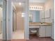 Bathroom featuring a vanity and walk-in shower with a glass door at 2055 Little Farms Ct, Deltona, FL 32738