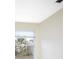 Bedroom with a large window view to the exterior grounds at 2055 Little Farms Ct, Deltona, FL 32738