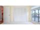 Bedroom with a lake view, large closet, and natural light from a window at 2055 Little Farms Ct, Deltona, FL 32738
