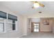 Bright living room with large windows and views to the adjacent rooms at 2055 Little Farms Ct, Deltona, FL 32738
