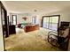 Spacious bedroom with sliding glass doors that opens up to a private balcony at 2068 Pennsylvania Dr, Deland, FL 32724