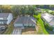 Aerial view of a charming home with lush greenery at 2110 3Rd Ave, Deland, FL 32724