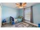 Bedroom with ceiling fan and a large window at 2110 3Rd Ave, Deland, FL 32724