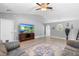 Spacious living room with wood-look floors and vaulted ceilings at 2110 3Rd Ave, Deland, FL 32724
