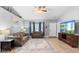 Inviting living room with tile floors, vaulted ceilings, and neutral paint at 2110 3Rd Ave, Deland, FL 32724