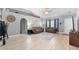 Inviting living room with tile floors, vaulted ceilings, and neutral paint at 2110 3Rd Ave, Deland, FL 32724