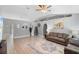 Inviting living room with tile floors, vaulted ceilings, and neutral paint at 2110 3Rd Ave, Deland, FL 32724