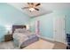 Bright main bedroom with en-suite bathroom and walk-in closet at 2110 3Rd Ave, Deland, FL 32724