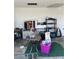 The garage shows a workspace with tools and storage, providing space for projects and organization at 2210 Se 1St St, Orange City, FL 32763