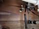 Plumbing and shut off valves under a sink, essential for maintenance and repairs at 2210 Se 1St St, Orange City, FL 32763