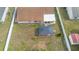Aerial view of home with large backyard and covered patio at 2287 Belen Dr, Deltona, FL 32738