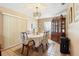 Cozy dining area with elegant chandelier, traditional furnishings, and tile flooring at 2287 Belen Dr, Deltona, FL 32738