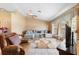 Comfortable living space with a large sectional sofa, stylish rug, and neutral decor at 2287 Belen Dr, Deltona, FL 32738