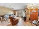 Spacious living area with tile floors, comfortable seating, and classic decor elements at 2287 Belen Dr, Deltona, FL 32738