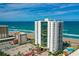 Aerial view showcasing the beachfront condo building with ocean views at 2425 S Atlantic Ave # 1202A, Daytona Beach Shores, FL 32118