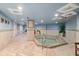 Indoor hot tub featuring tiled floors, soothing lighting, and a relaxing ambiance for residents to unwind and rejuvenate at 2425 S Atlantic Ave # 1202A, Daytona Beach Shores, FL 32118