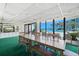 Meeting room with large table, scenic pool and beach views at 2425 S Atlantic Ave # 1202A, Daytona Beach Shores, FL 32118