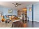 Comfortable living room featuring modern lighting, cozy seating, and inviting décor at 2800 N Atlantic Ave # 206, Daytona Beach, FL 32118