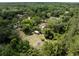 Expansive wooded acreage with a house, promising a serene and secluded living experience at 29505 North, Paisley, FL 32767