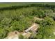 Expansive aerial view of a property surrounded by a dense forest landscape at 29505 North, Paisley, FL 32767