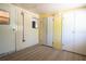 Hallway featuring storage closets and a textured floor at 29505 North, Paisley, FL 32767