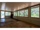 Enclosed sunroom with beautiful views of trees at 29505 North, Paisley, FL 32767