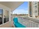 Enjoy the ocean breeze from this balcony, offering a partial view of the surrounding area at 2967 S Atlantic Ave # 202, Daytona Beach Shores, FL 32118