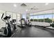Bright fitness center featuring modern exercise equipment and large windows for residents at 2967 S Atlantic Ave # 202, Daytona Beach Shores, FL 32118