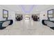 Modern lobby with marble floors, elegant decor, and comfortable seating areas at 2967 S Atlantic Ave # 202, Daytona Beach Shores, FL 32118