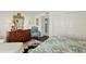 Main bedroom featuring a dresser and closet with dark wood floors and ocean views at 2967 S Atlantic Ave # 202, Daytona Beach Shores, FL 32118