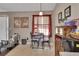 Bright breakfast nook with a window and cozy seating, adjacent to the kitchen at 3001 Inca Ct, Deltona, FL 32738