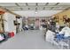 Spacious garage with ample storage, work area, and overhead lighting at 3001 Inca Ct, Deltona, FL 32738