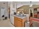 Practical kitchen area with a dishwasher, sink, and convenient access to living spaces at 3001 Inca Ct, Deltona, FL 32738