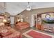 Comfortable living room with a TV, dining area, and comfortable seating at 3001 Inca Ct, Deltona, FL 32738