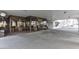 Building entryway with glass doors and covered parking at 3003 S Atlantic Ave # 21A2, Daytona Beach Shores, FL 32118
