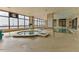Enjoy relaxing in the hot tub and indoor spa featuring natural light at 3003 S Atlantic Ave # 21A2, Daytona Beach Shores, FL 32118