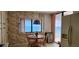 Eat-in kitchen with ample cabinet space provides ocean views and access to the balcony at 3003 S Atlantic Ave # 21A2, Daytona Beach Shores, FL 32118